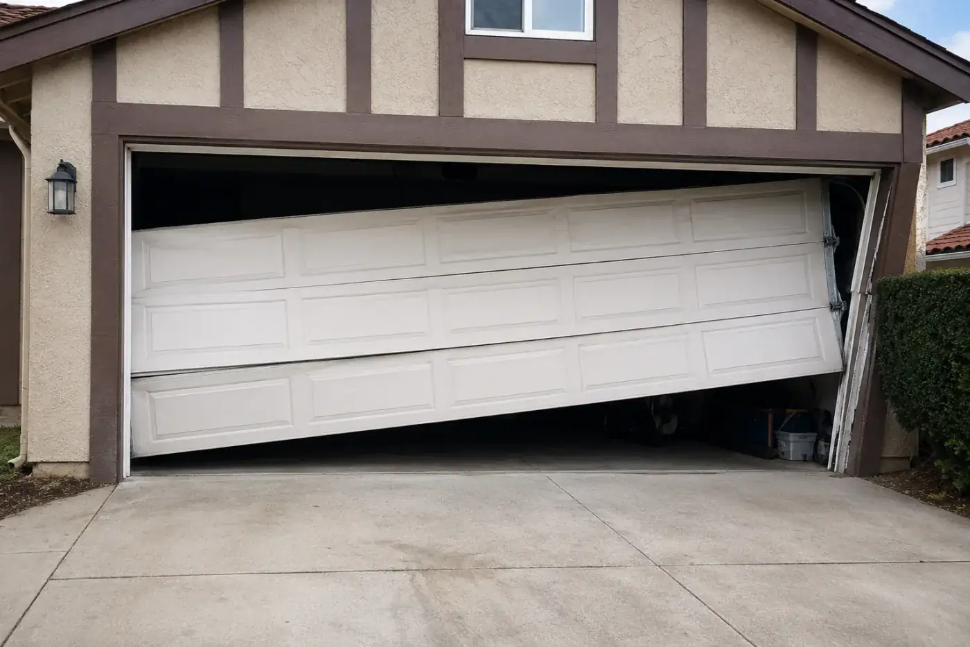 Technician performing emergency garage door repair
