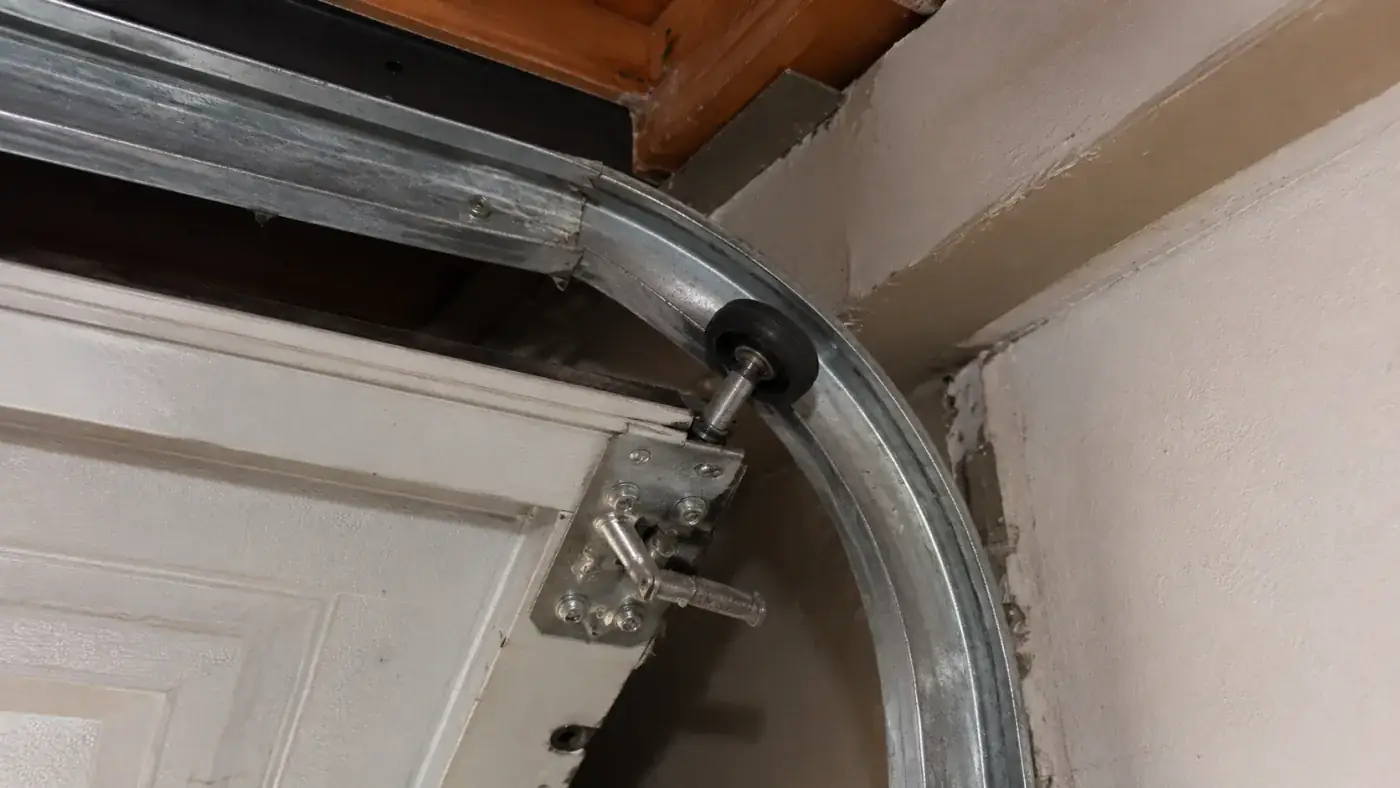 Off track garage door requiring repair